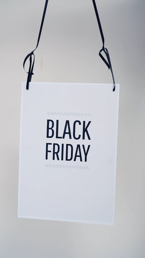 Black Friday Written on a Hanging Shopping Bag