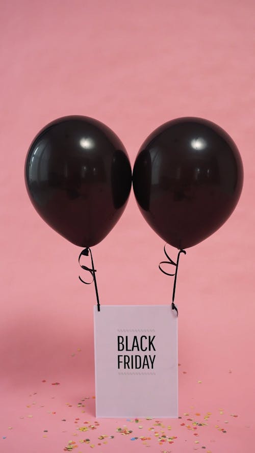 A Poster With a Written Black Friday Tied on a Balloon