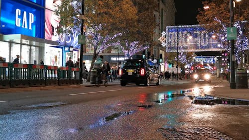 A Street In London Filled With Christmas Decorations