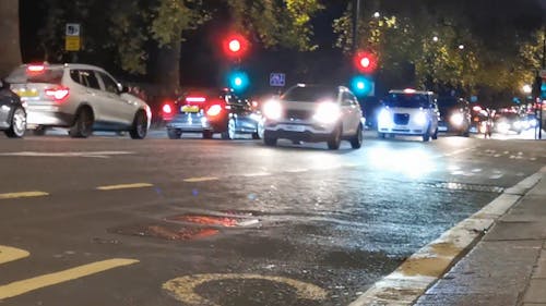 Cars Stopping at Traffic Light