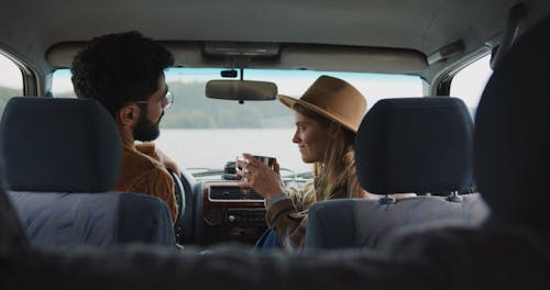 Couple Talking while Sitting in the Car