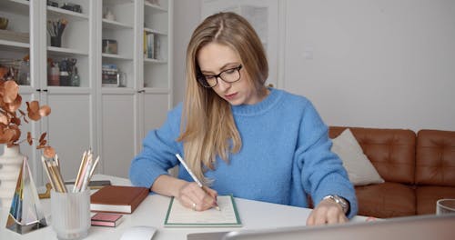 Woman Taking Notes