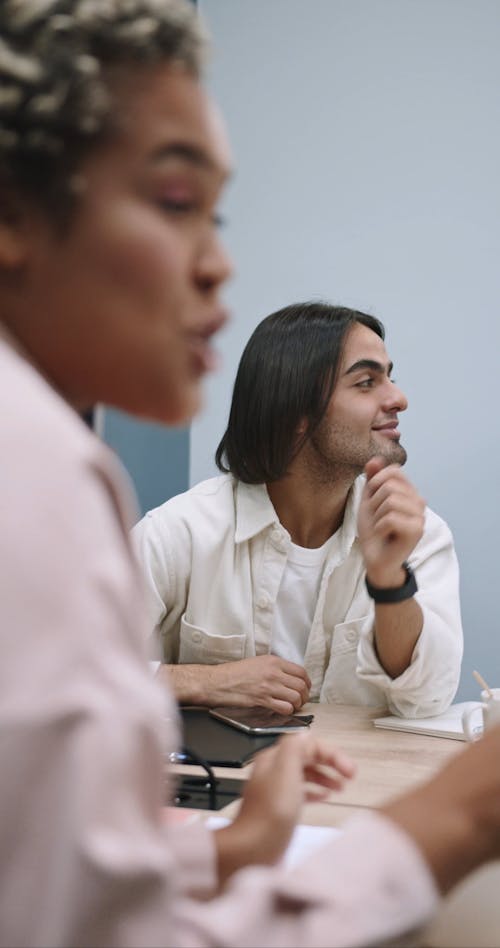 People Discussing Ideas at an Office Meeting