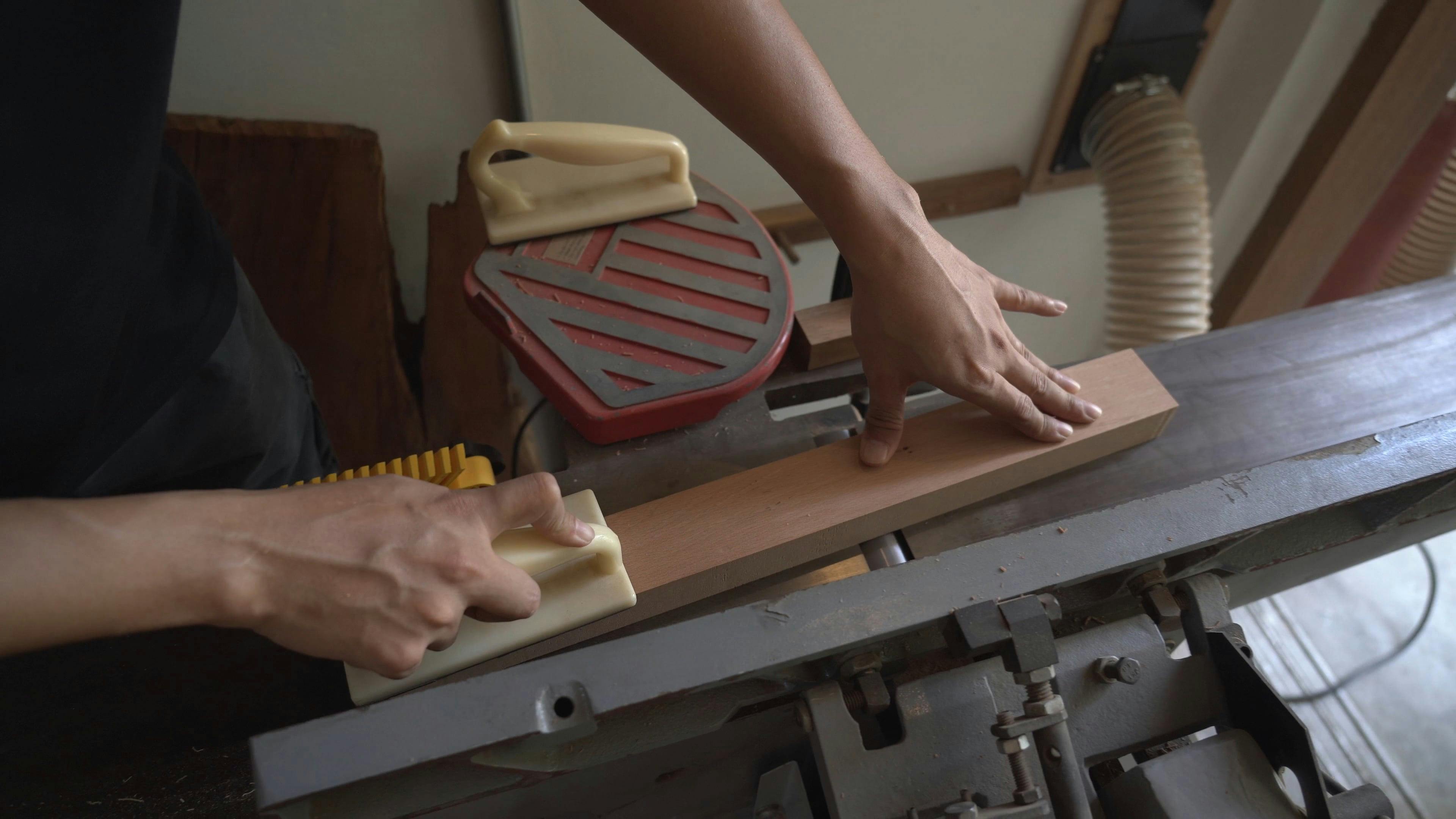 A Person Using a Wood Polishing Machine Free Stock Video Footage