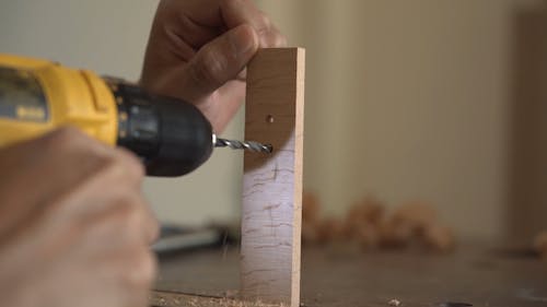 Drilling Holes On A Piece Of Wood