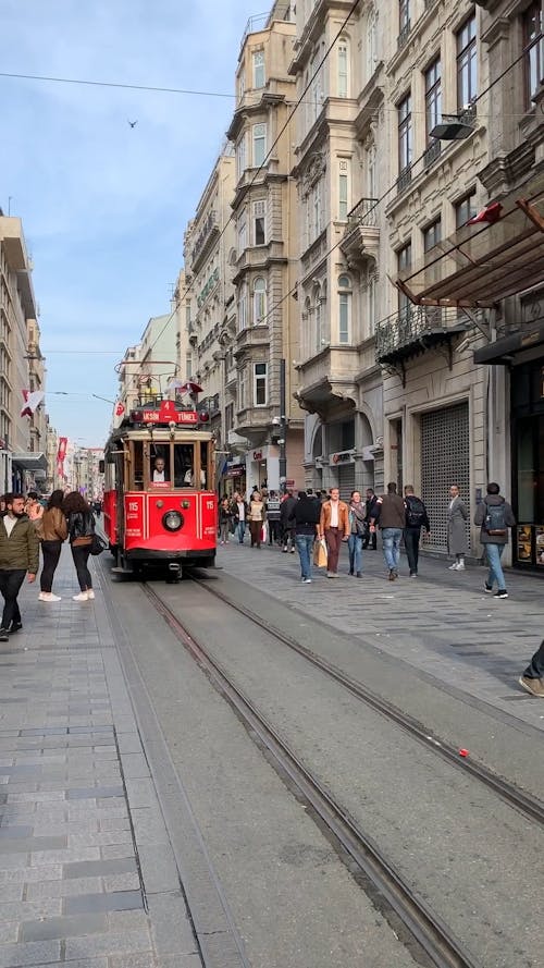 Front View of a Tram Moving Forward in the Street