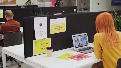 A Woman Engaged In A Video Conference