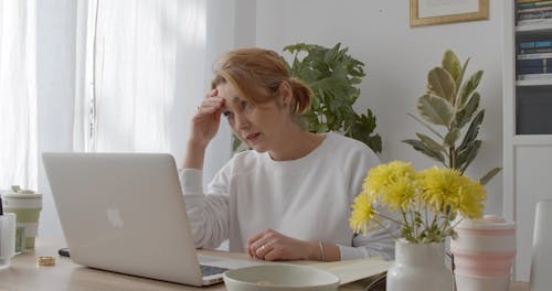 A Woman Looking Frustrated While Talking