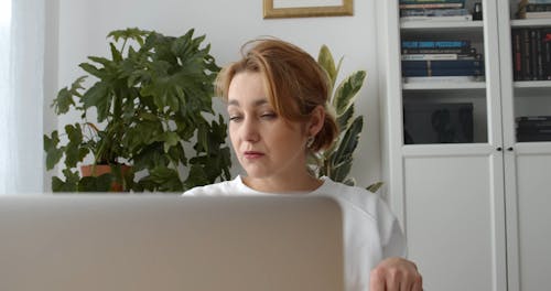 A Woman Looking Frustrated While Talking