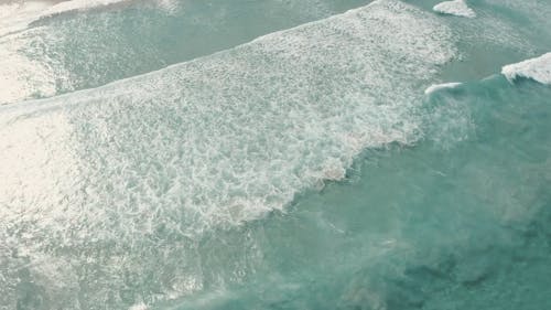 Waves in a Clear Beach 