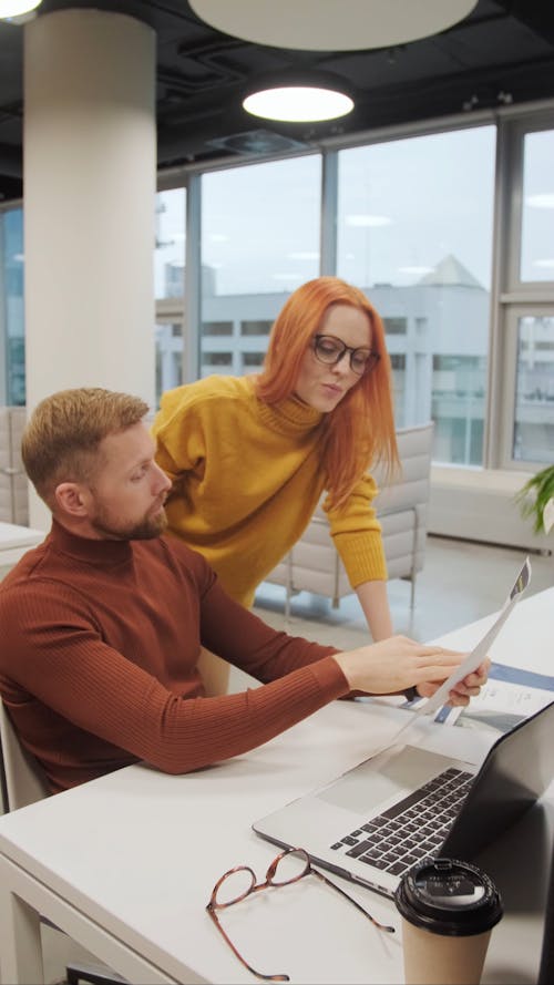 Man and Woman Busy Talking and Discussing With Each Other