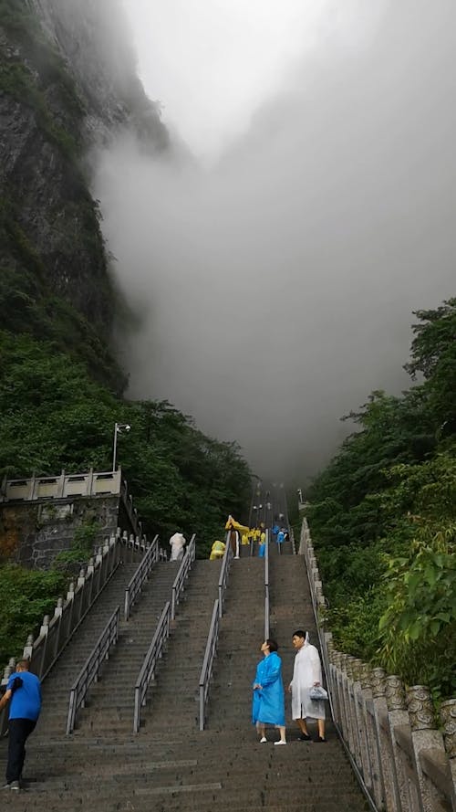 Vertical Video of Staircase Between Rock Mountain