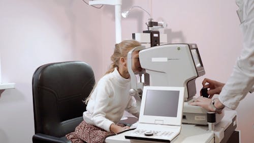 A Young Girl Getting an Eye Examination