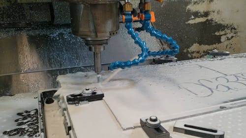 Cnc Machine Tool Cutting Metal With Coolant Spray