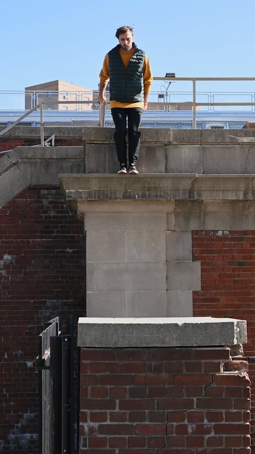 A Young Man Jumping From High Places