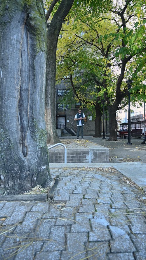 A Man Running them Jumping on the Street