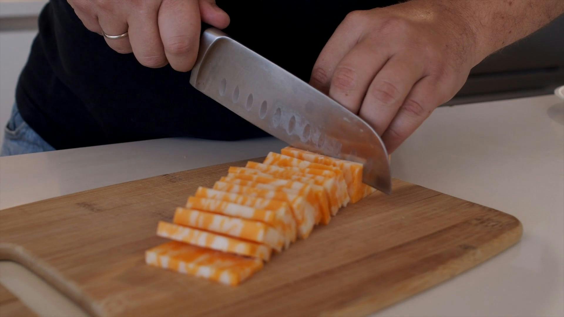 Slicing Cheese With A Knife · Free Stock Video