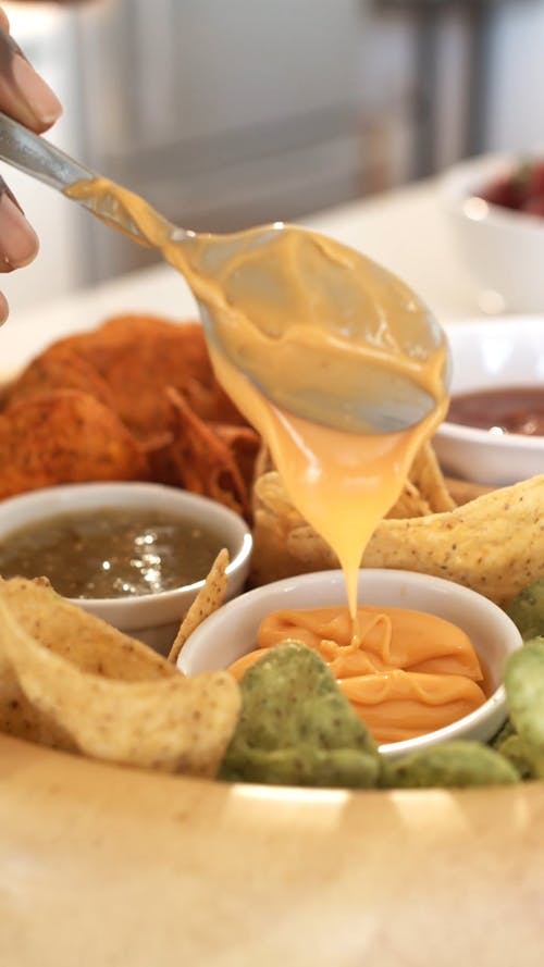 A Woman Preparing A Chips Platter