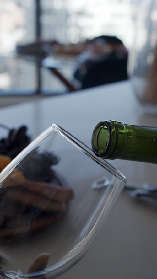 Pouring Red Wine In A Glass