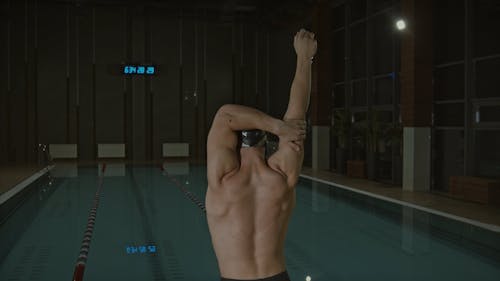 A Swimmer Doing Stretching