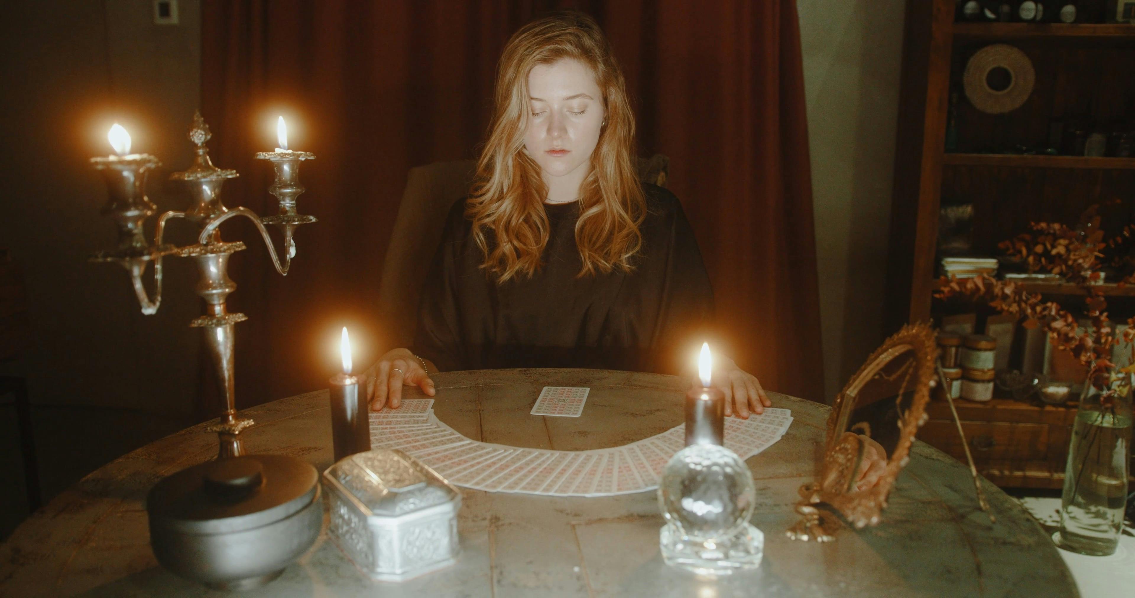 Young Woman Reading Tarot Cards · Free Stock Video