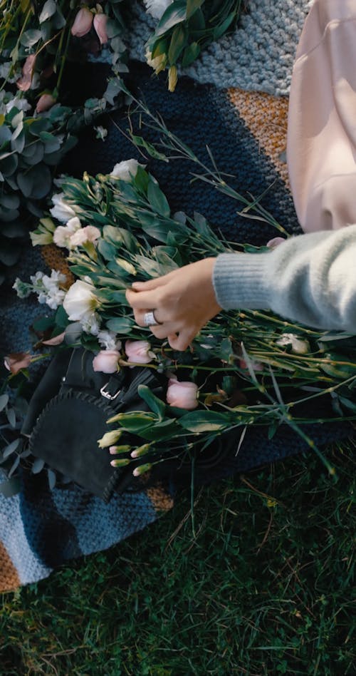 Unrecognizable Person Making a Flower Bouquet