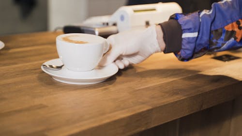 A Person Getting a Cup of Coffee