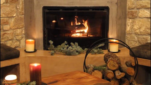 Fireplace in a Christmas Decorated Room