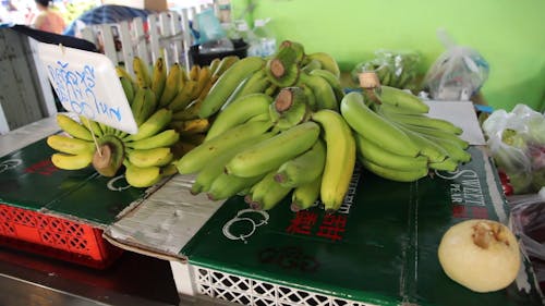 Bunch of Bananas Displayed on a Stall