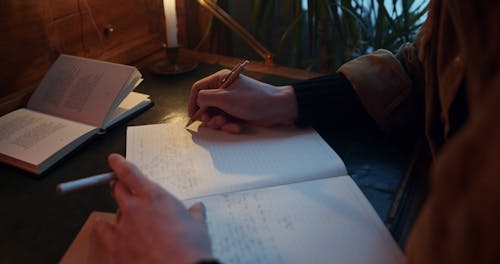 Jewish Man Writing on a Notepadd