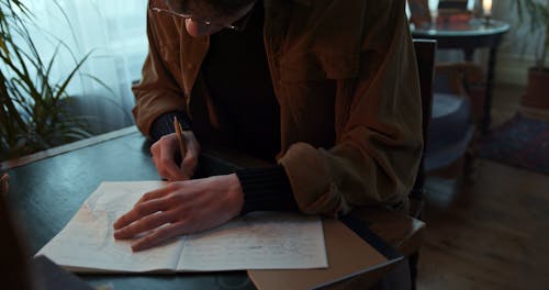 Jewish Man Tearing Off a Piece of Paper