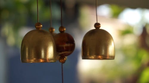 Close-up Shot of Wind Chimes Moving with the Wind