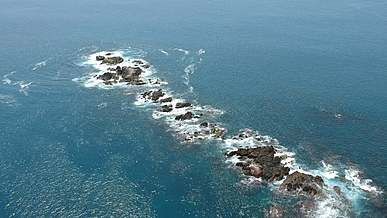 aerial footage of rocky beach