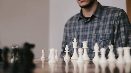 A Man Playing Chess