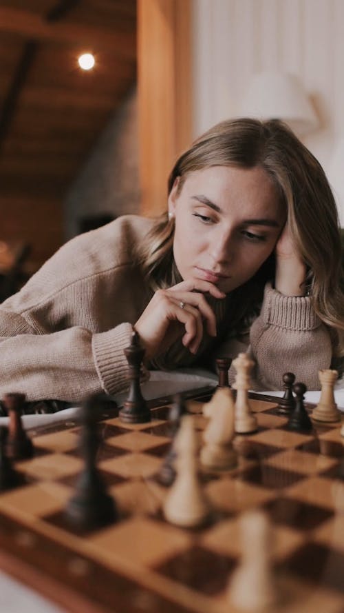 A Woman Playing Chess