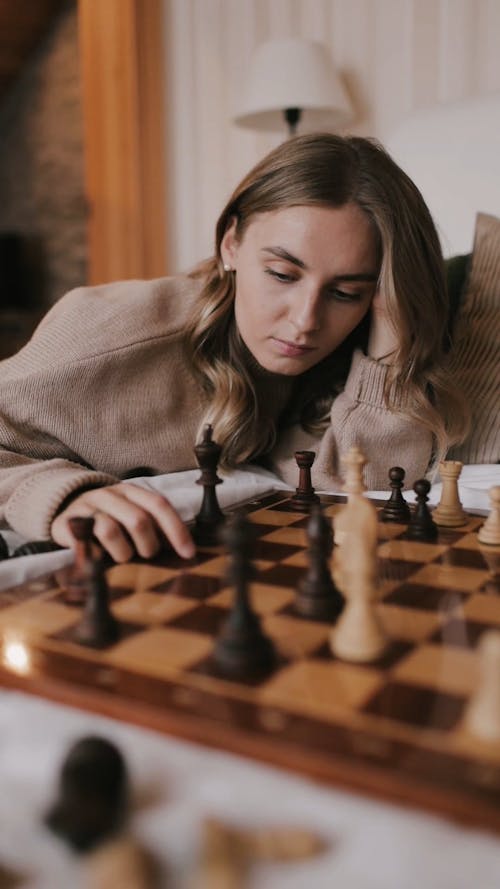 A Woman Playing Chess