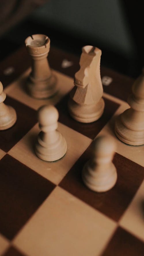 Spotlight On Chess Game In Progress Between Gold And Silver Pieces, Static  Shot Free Stock Video Footage Download Clips
