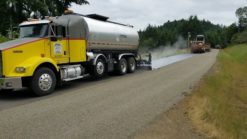 Truck Paving a Road