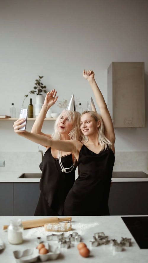 Mother And Daughter Dancing For A Selfie Video