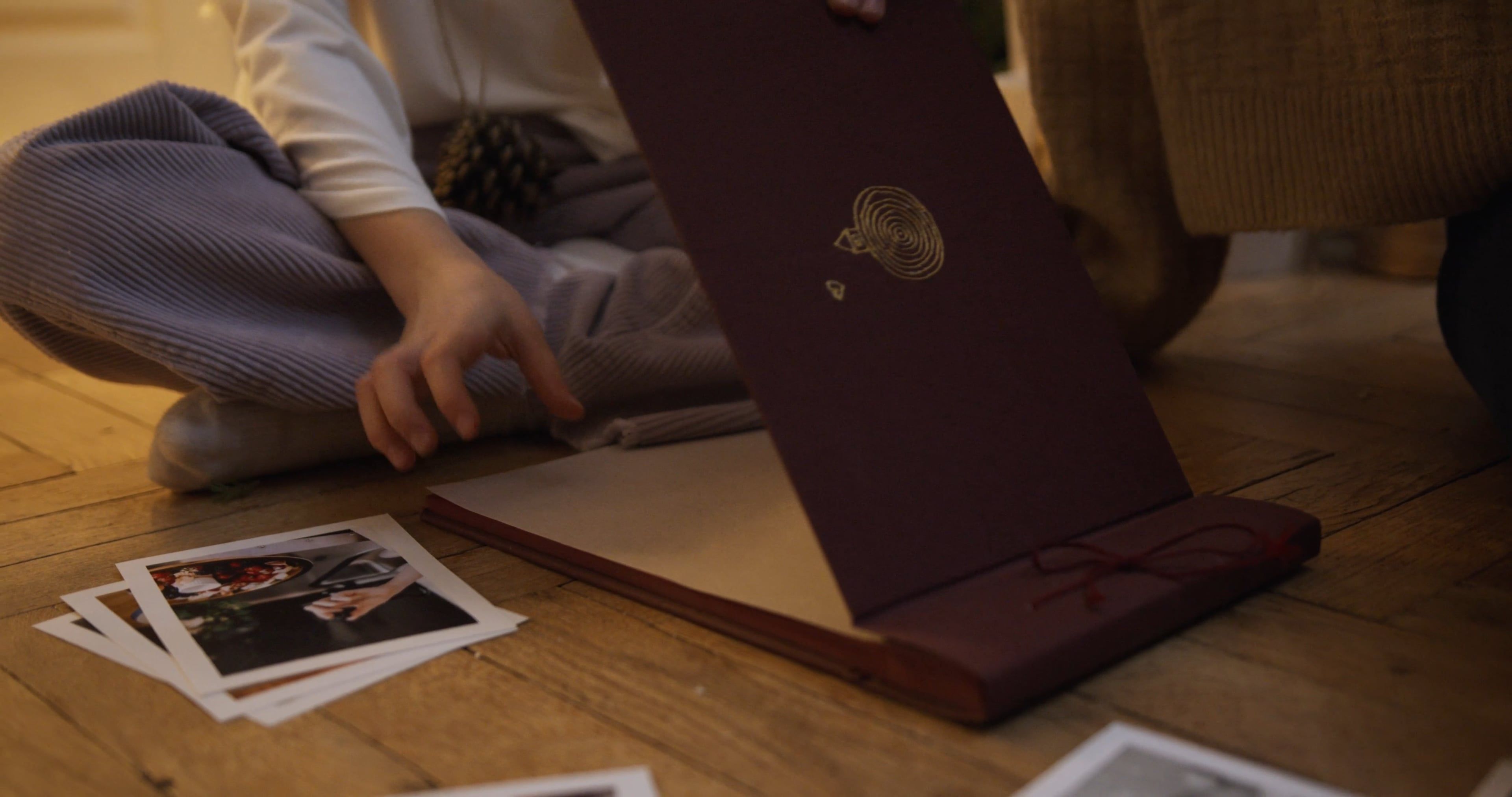 Family Placing Photgraphies on Photo Album Free Stock Video Footage ...