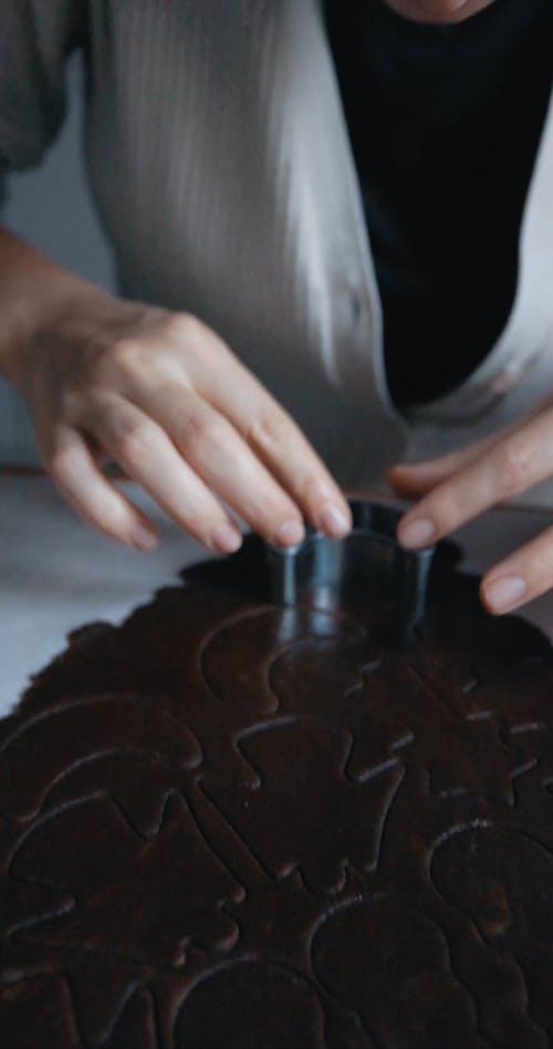 Woman Cutting Cookies to Different Shapes