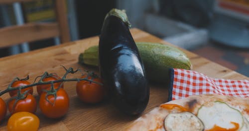 Pizza with Eggplant and Red Peppers Toppings