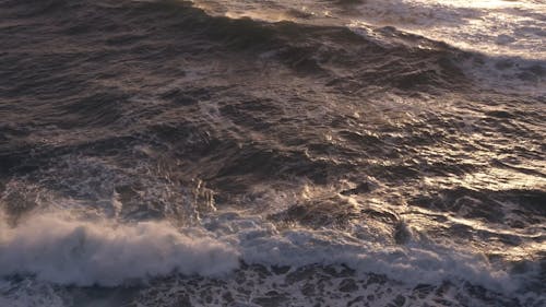 Sea Waves Reaching Rocky Shore