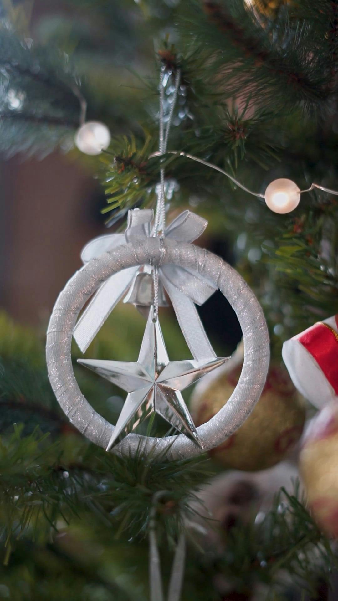 Shiny Star on a Christmas Tree · Free Stock Video