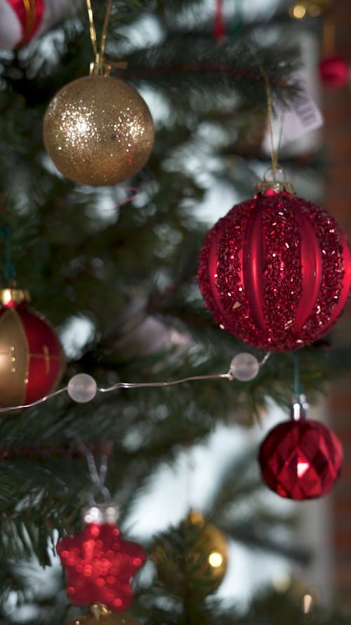 Close Up of Christmas Balls Hanging in a Christmas Tree