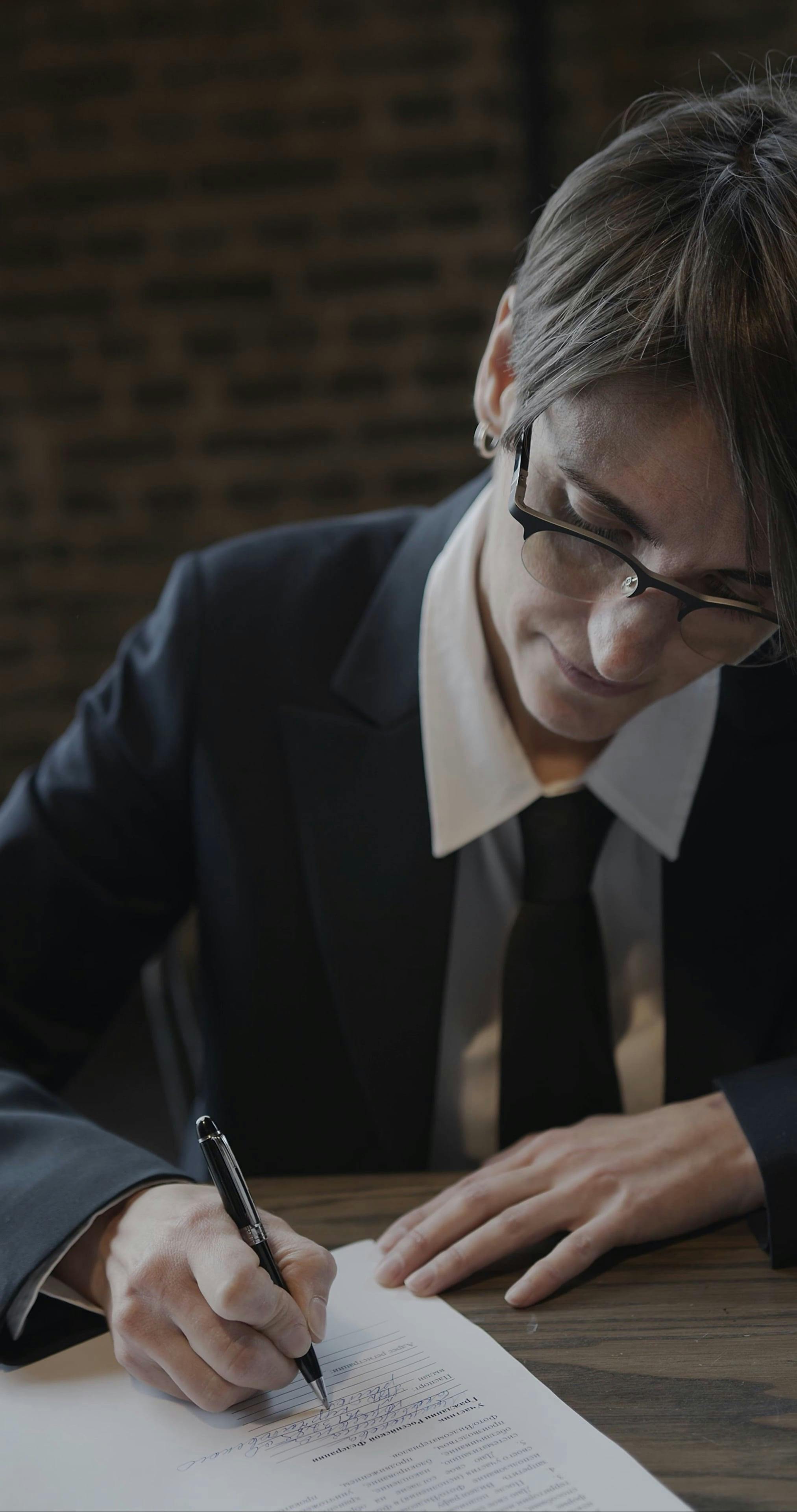 Woman Signing A Document Free Stock Video
