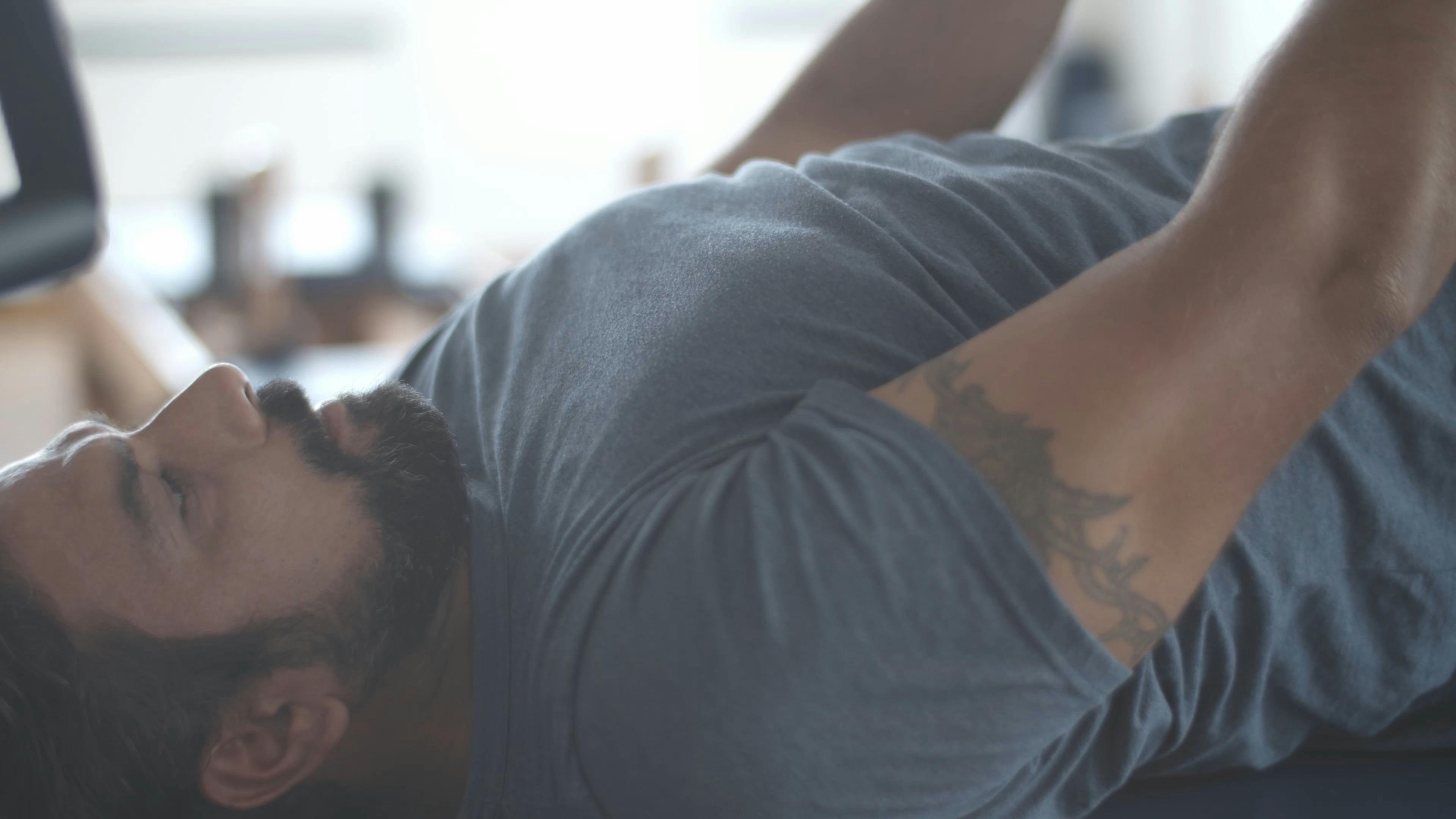 A Man Doing Leg Stretch Exercise · Free Stock Video