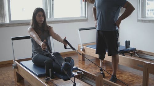 Physiotherapist Demonstrating The Exercise