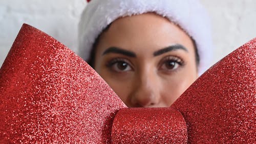 Closeup Woman Holding Christmas Decoration