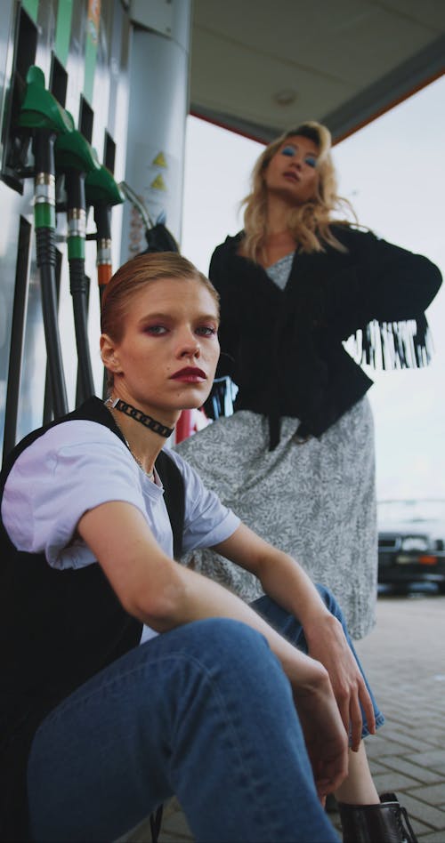 Women Posing on Gas Station 